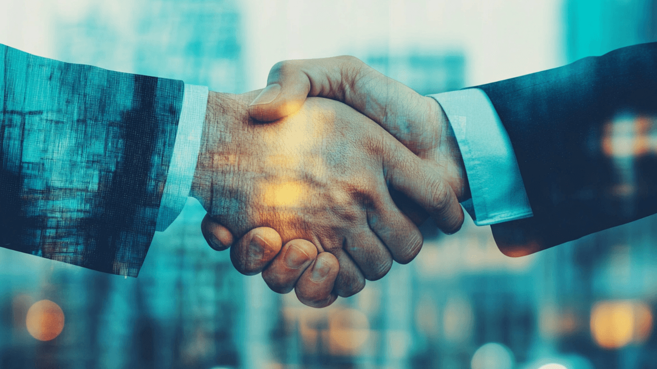 photo of two business man hand shaking office background. Image Credit: Adobe Stock Images/Syed Qaseem Raza