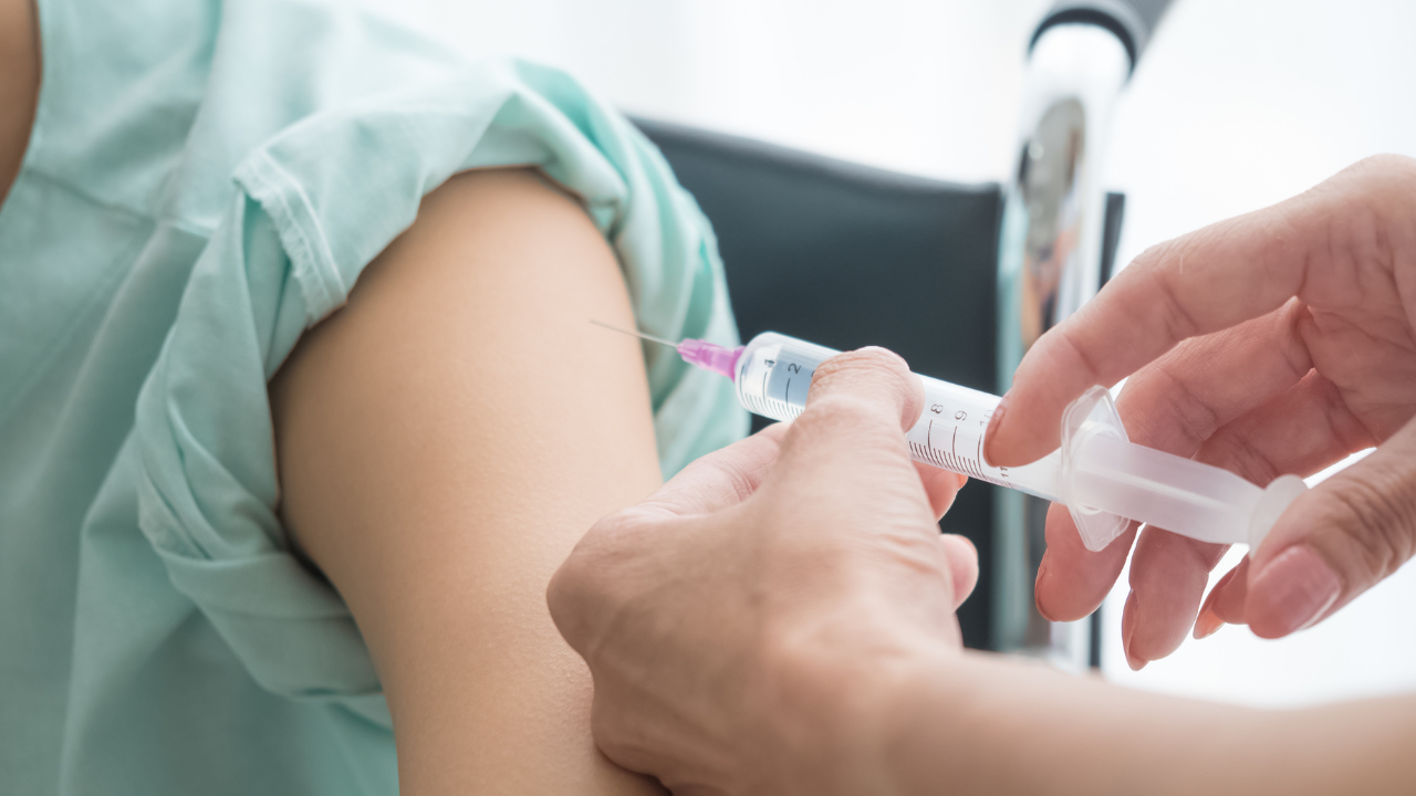 Hospital clinic or labortory doctor nurse and scientist inject vaccine body arm protection treatment health care covid-19 rsv corona virus allegy phlegm fever influenza patient medical insurance. Image Credit: Adobe Stock Images/StreetOnCamera